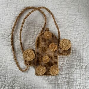 Cactus shaped woven straw shoulder bag with pom poms